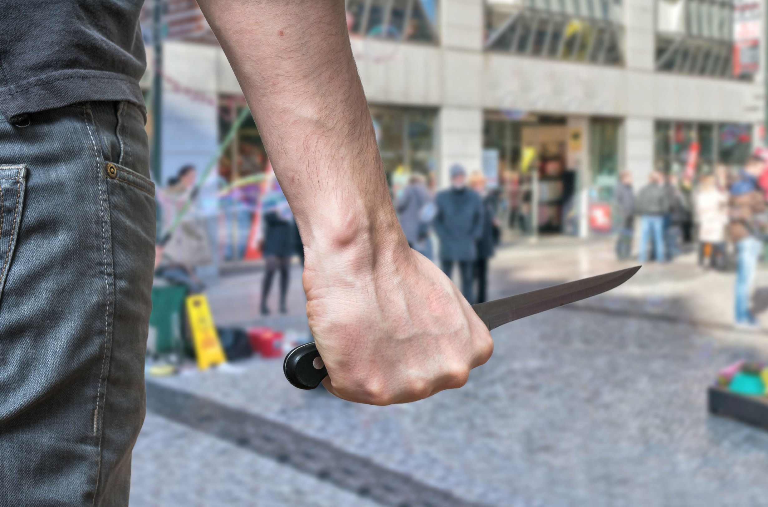 Man with a knife on the street